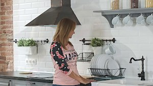 Busty natural teen fucks in the kitchen