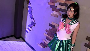 Asian dressed as Sailor Jupiter sucks a hard dick